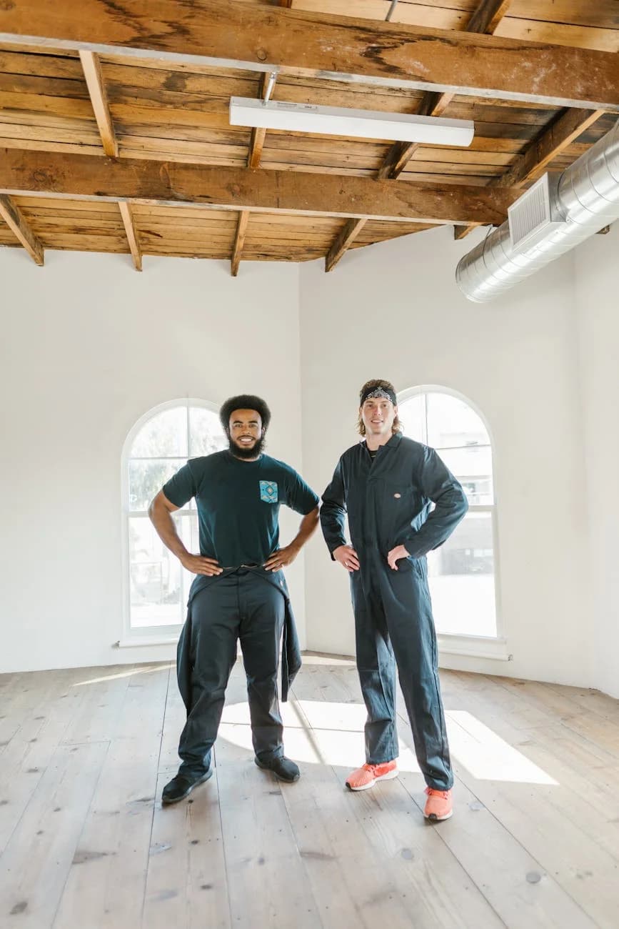 Two Professional Movers In An Empty Apar 2