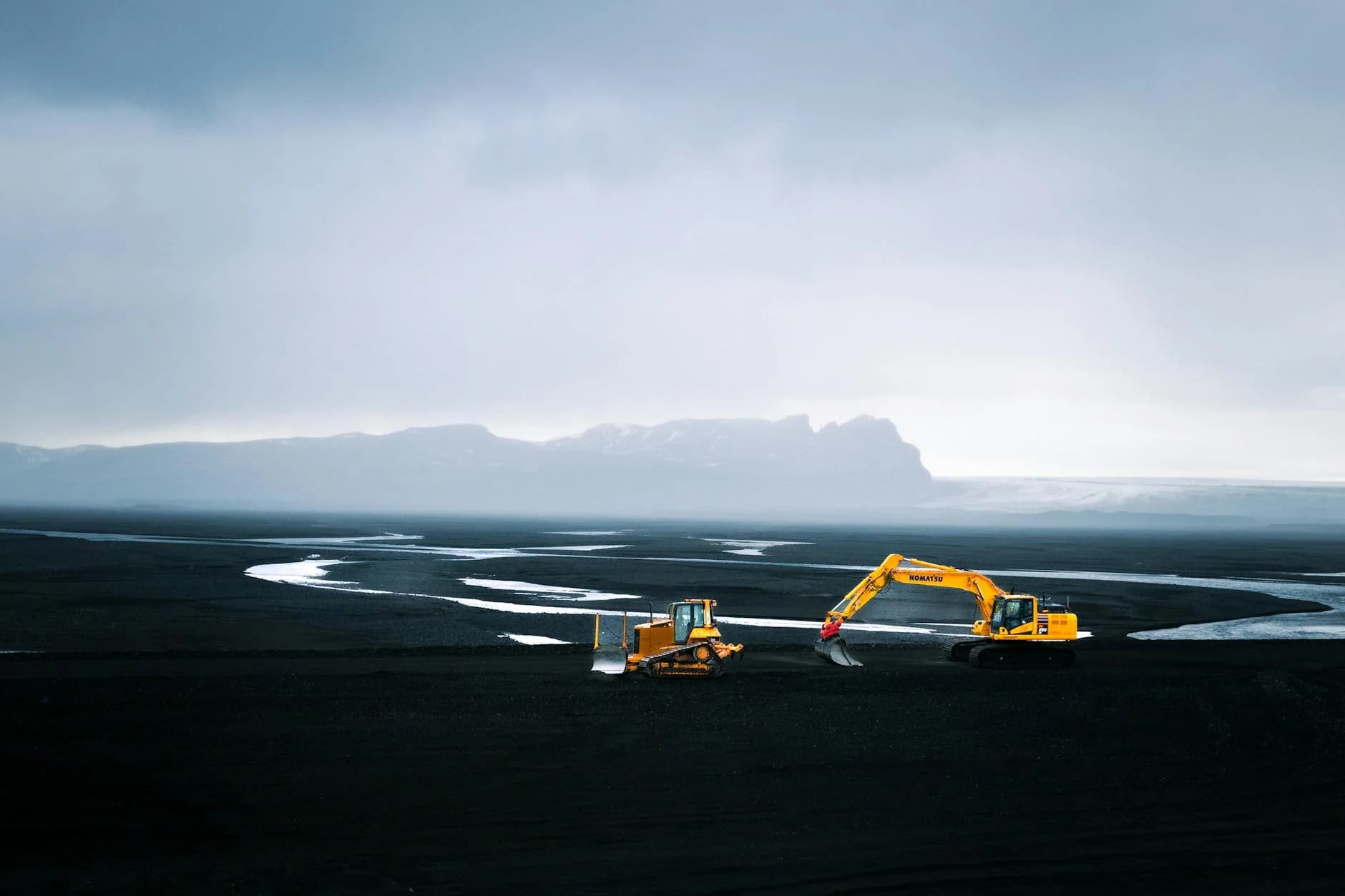 An Aerial Shot Capturing A Bulldozer And 1