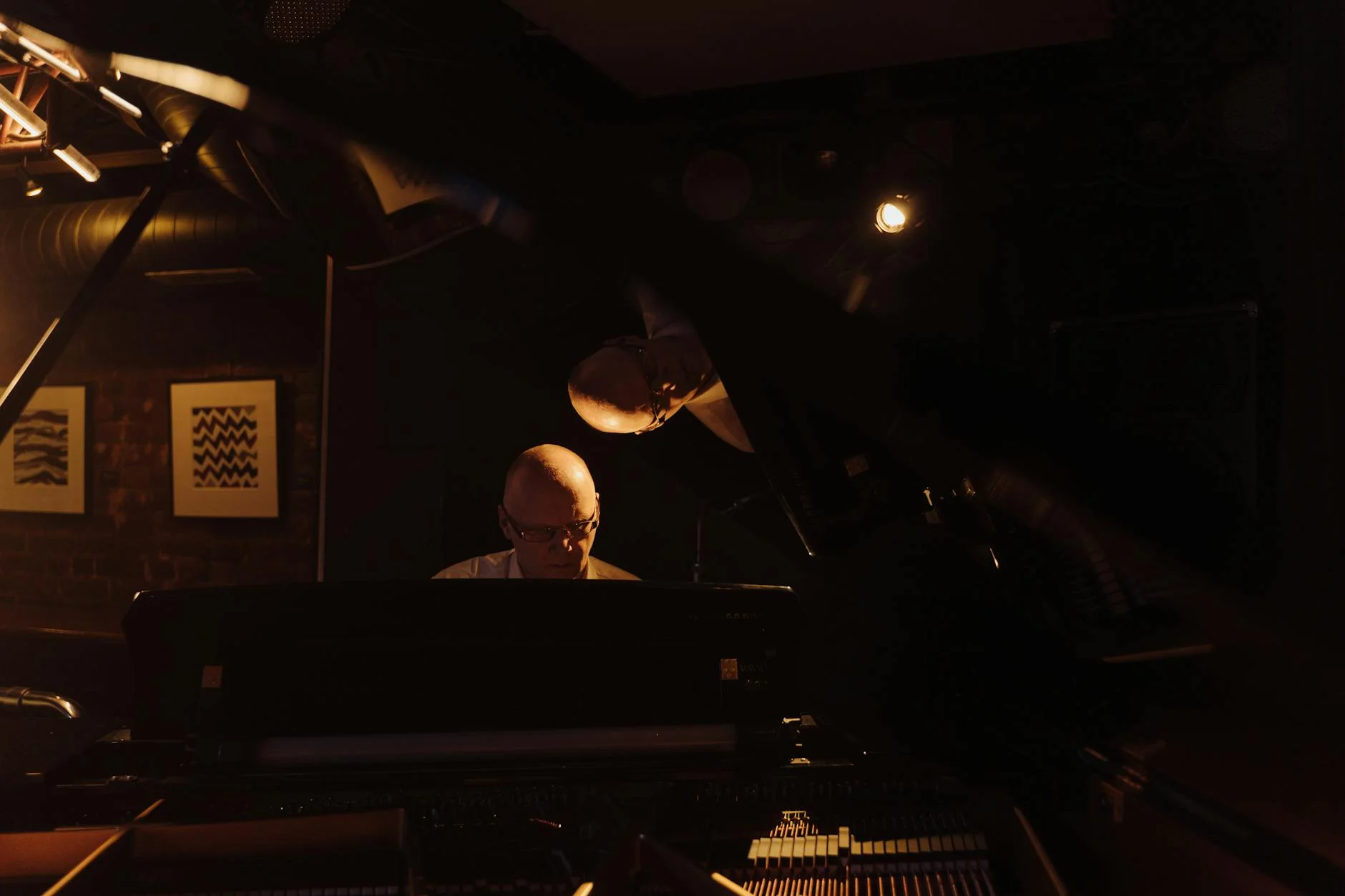 An Elderly Man Playing Piano In A Dark J 1