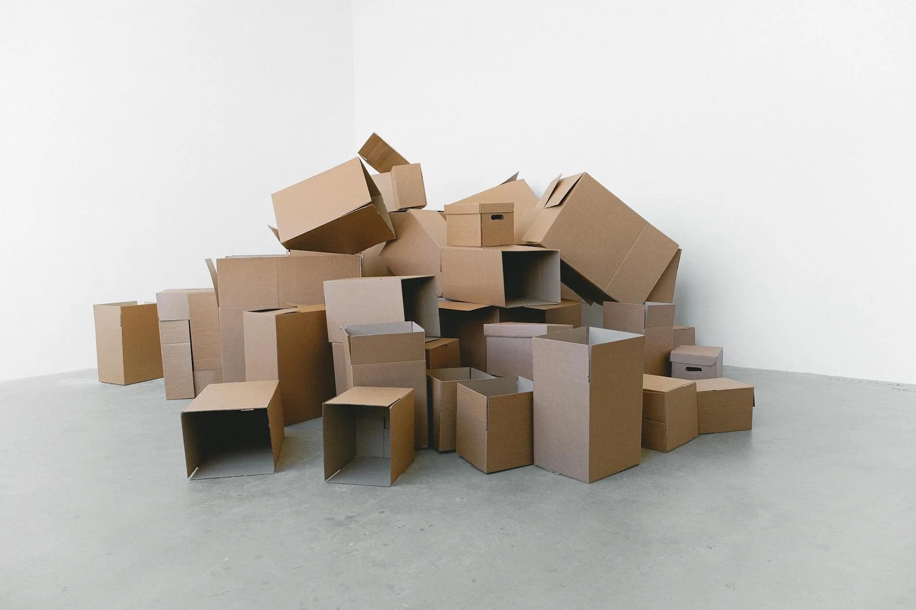 A Pile Of Empty Cardboard Boxes Arranged 1