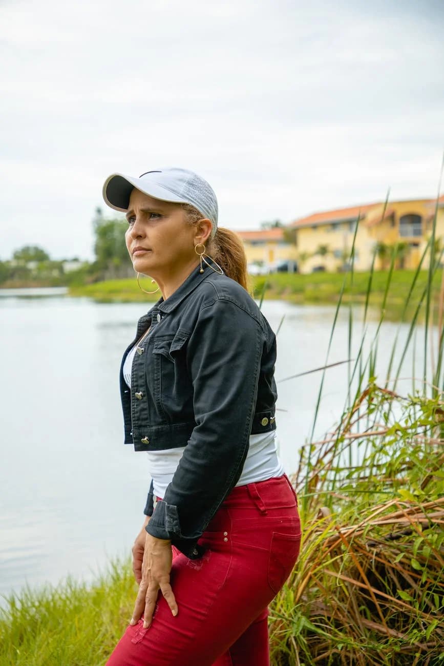 Woman In A Denim Jacket And Red Pants By 3