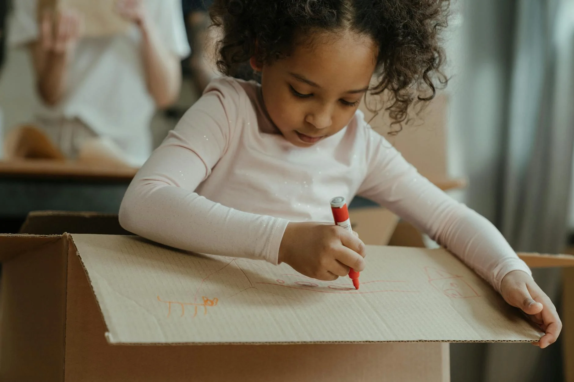 Young Girl Engrossed In Drawing On A Car 2