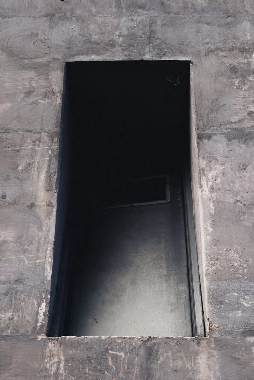 A Mysterious Dark Doorway Set In A Rugge 2
