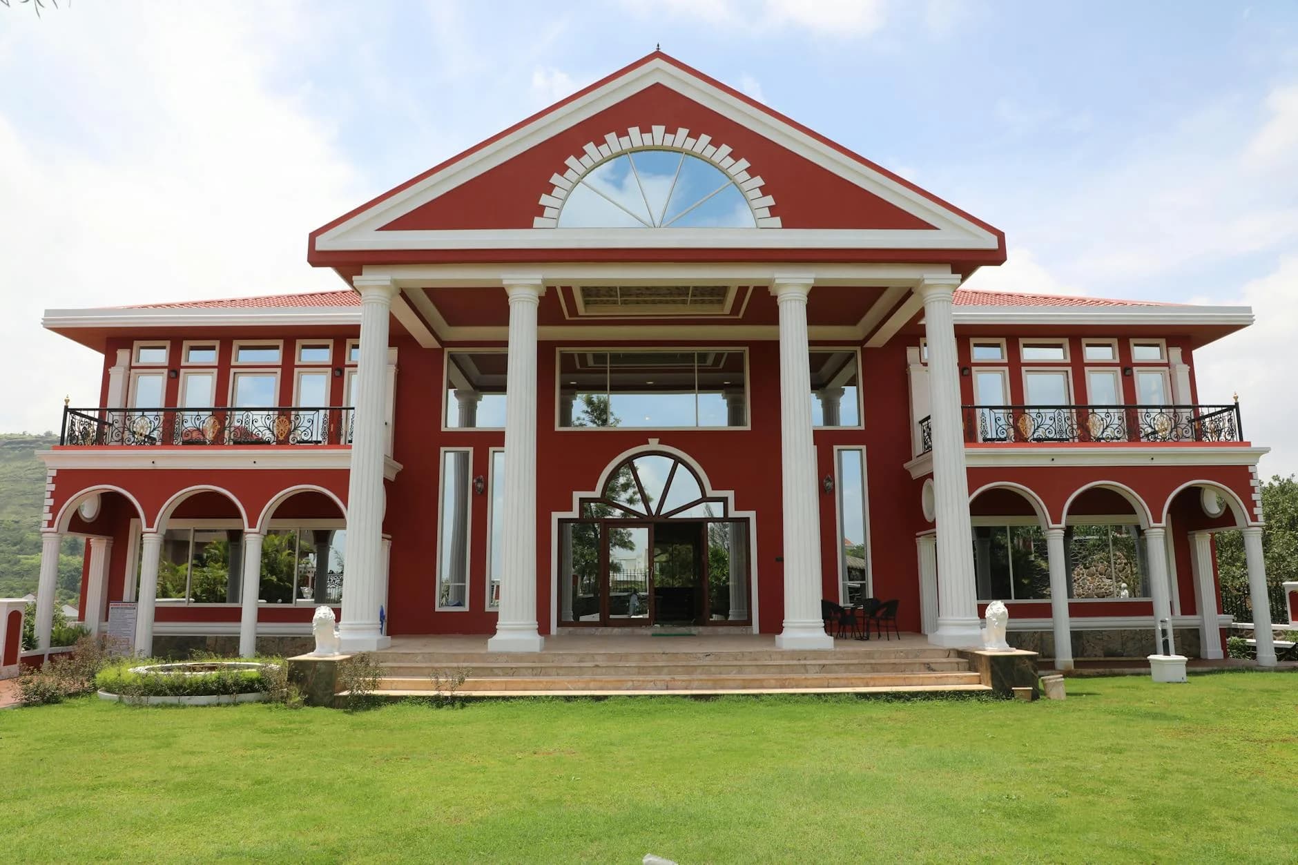 A Grand Red Mansion Showcasing Classic C 3