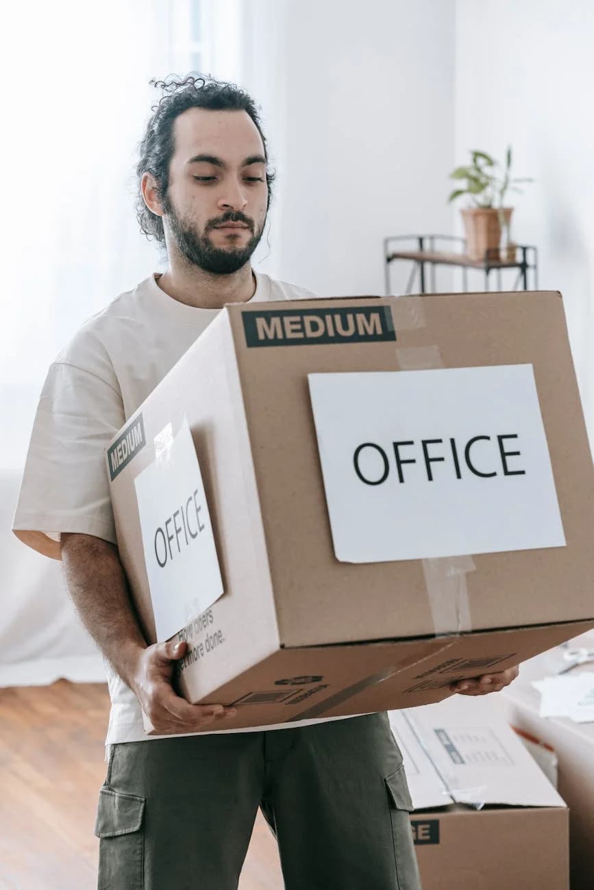 Man Moving Box Labeled Office Indoors Du 4