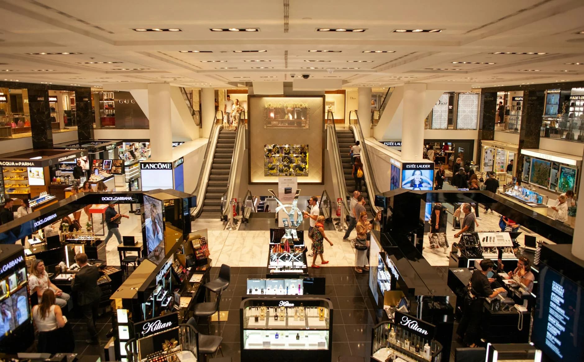 A Bustling Scene Inside A Modern Shoppin 1