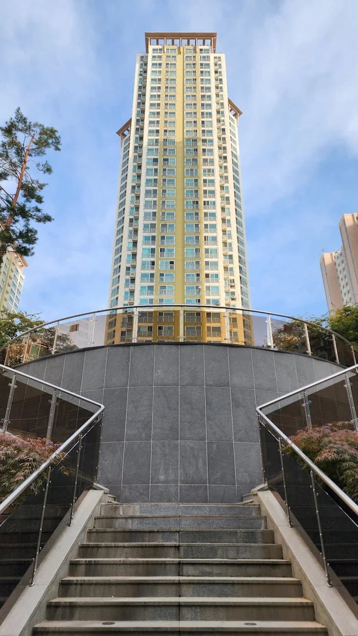 Upward View Of A Tall Modern Building Wi 2