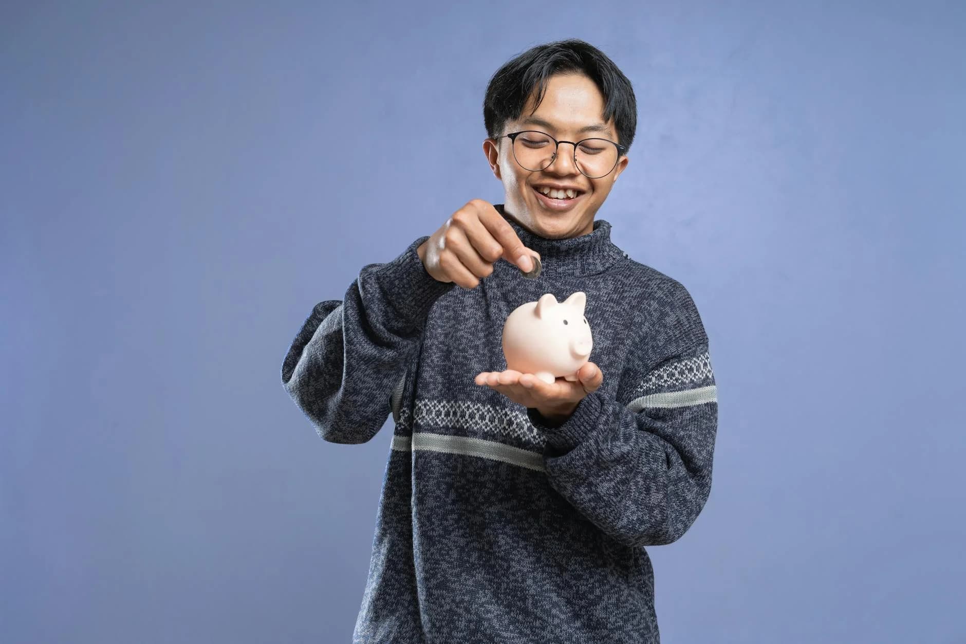 Smiling Man Holding A Piggy Bank And Ins 2