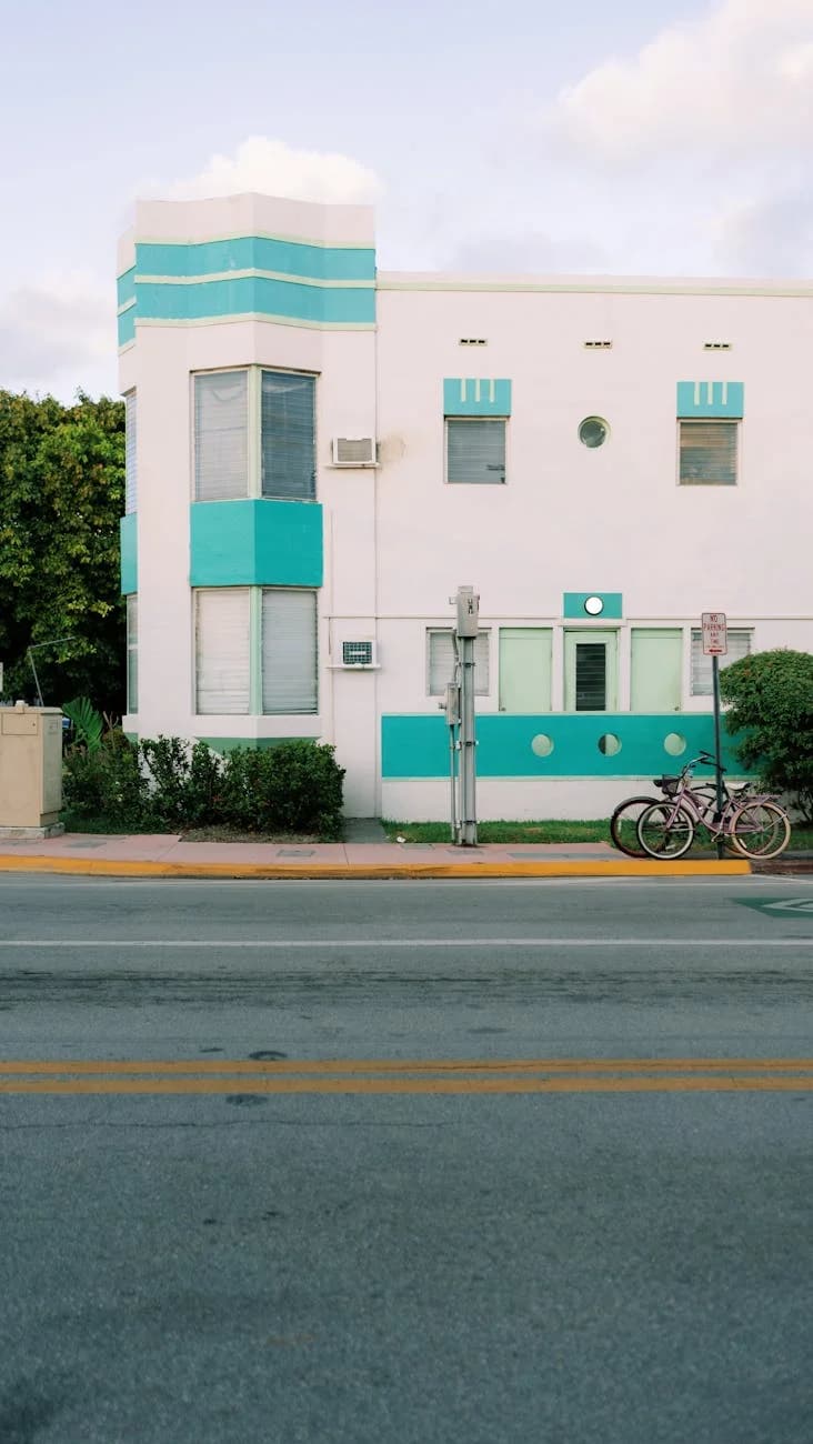 Art Deco Building With Teal Accents And 2