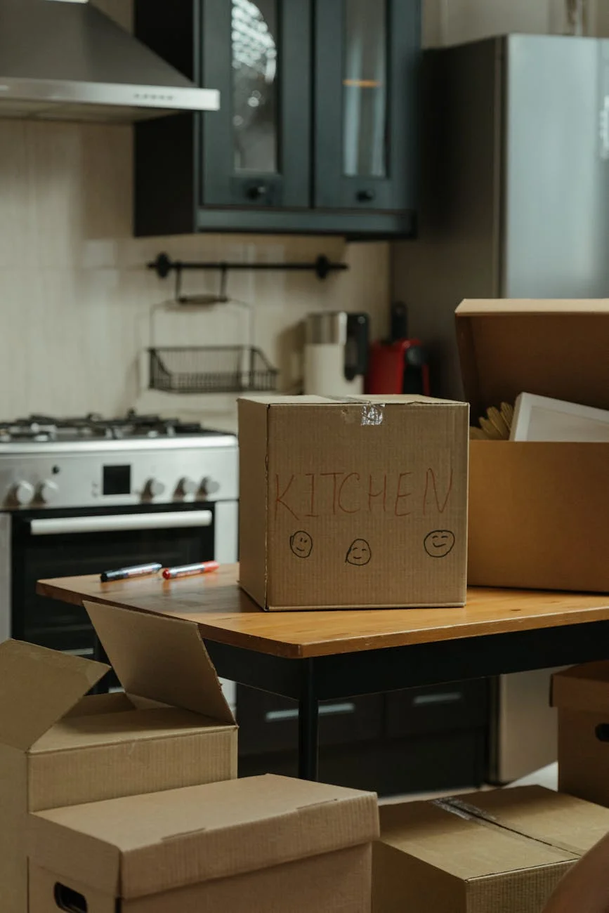 Cardboard Moving Boxes In A Modern Kitch 2
