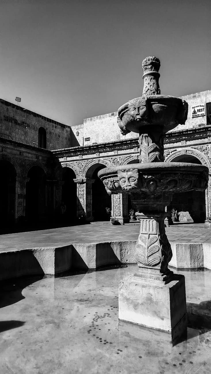 Black And White Image Of A Carved Stone 3