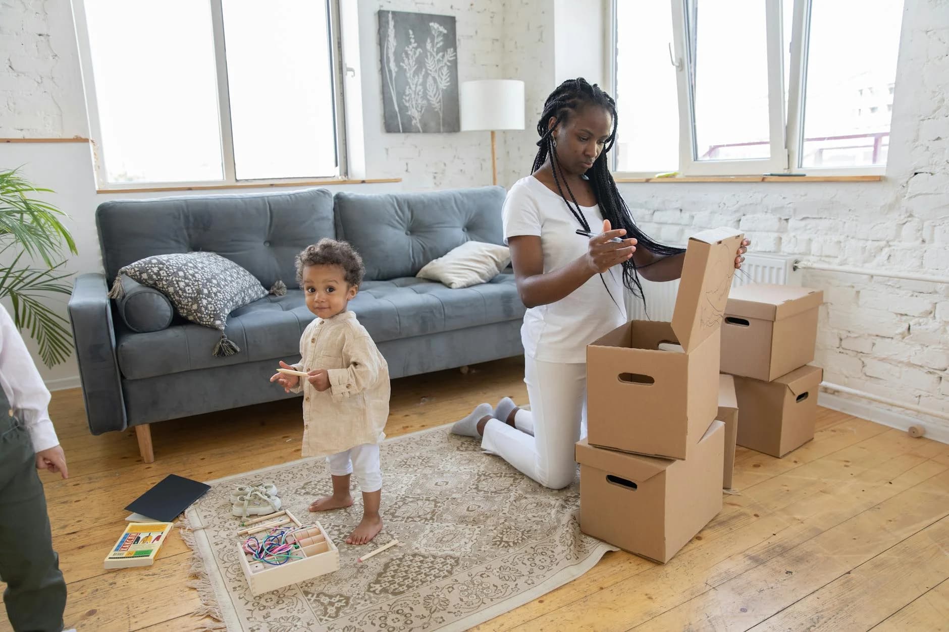 Mother And Child Packing Boxes In A Brig 1