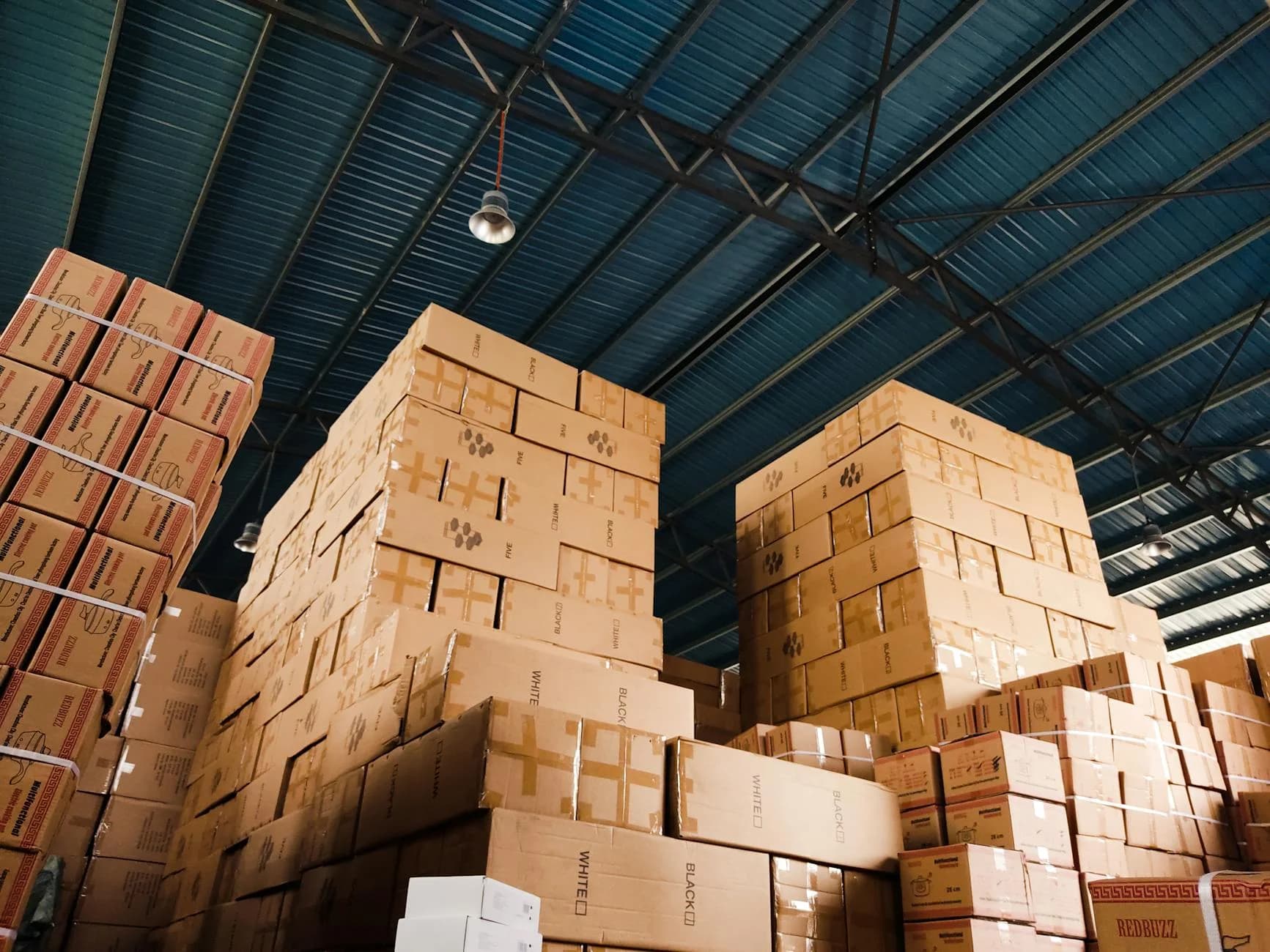 High Stacks Of Cardboard Boxes Organized 4