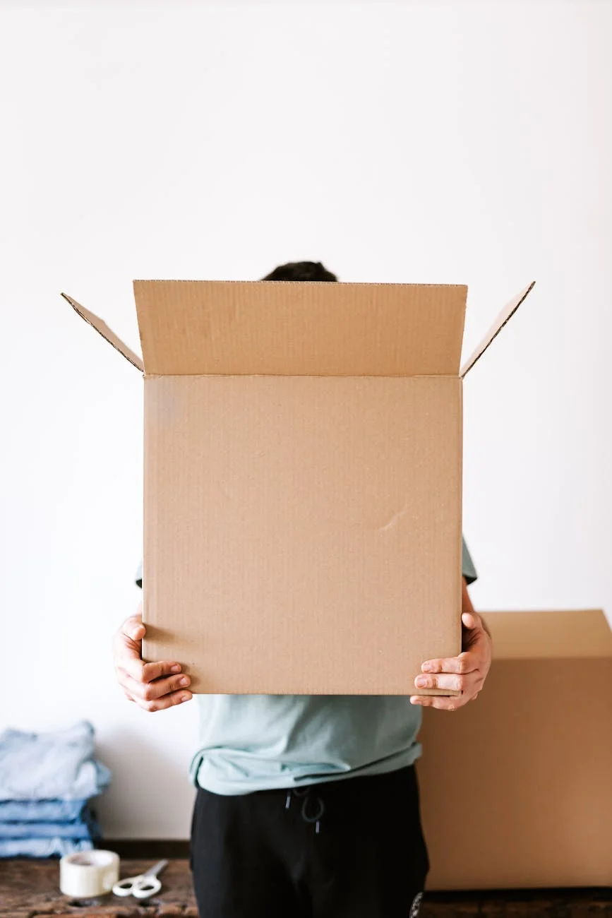Faceless Individual Holding An Open Card 1