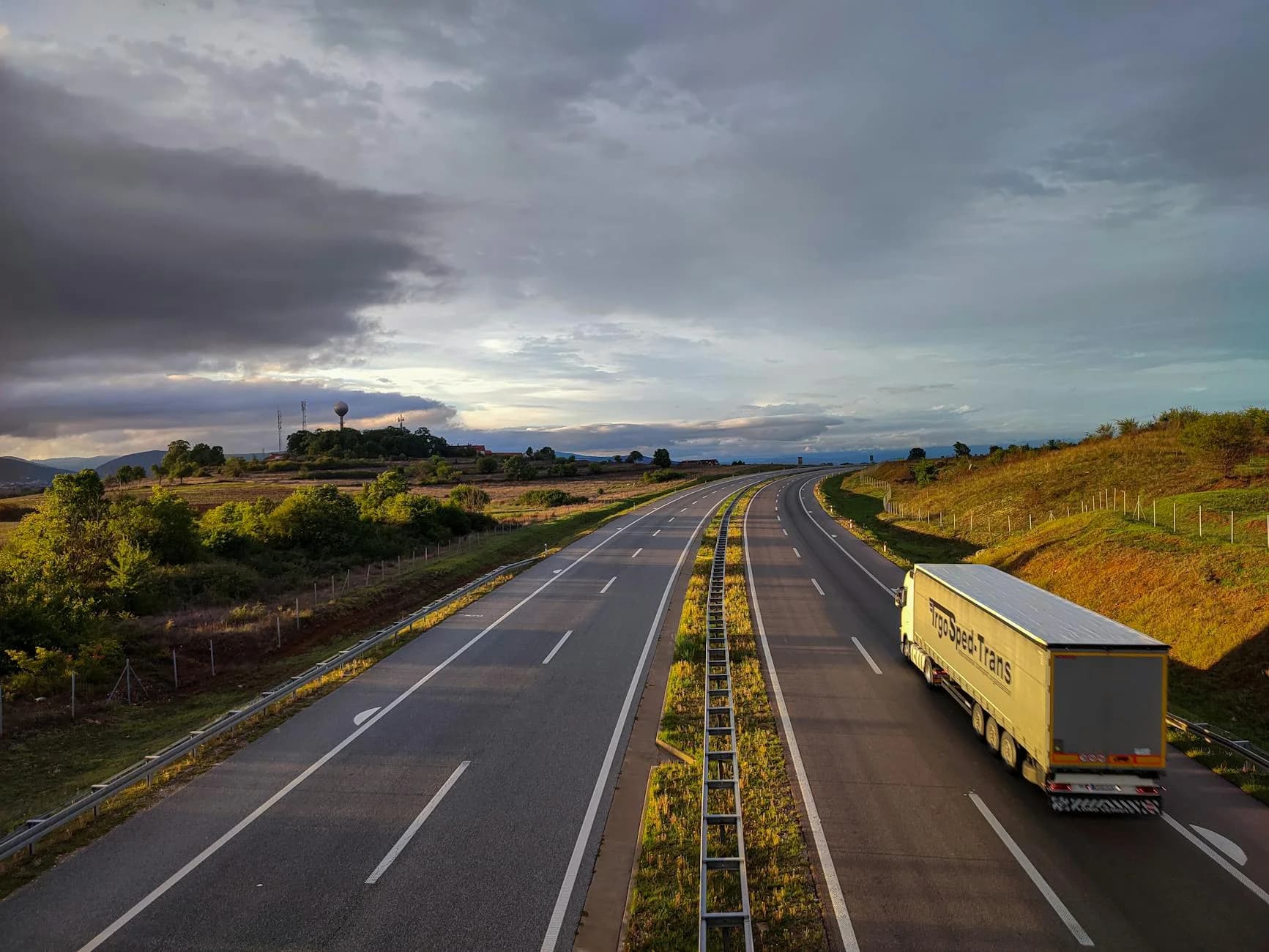 A Scenic Highway Under A Dramatic Cloudy 3